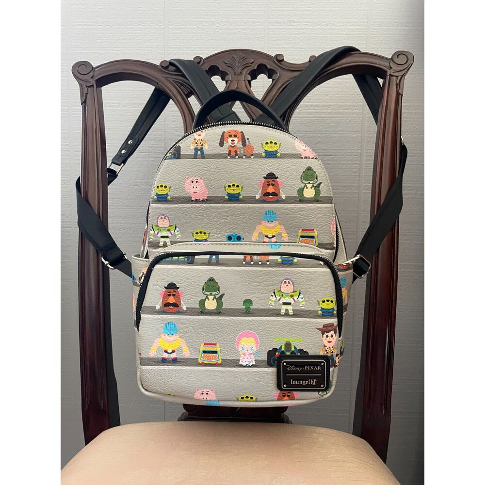 Loungefly Disney Pixar Toy Story Woody & Buzz Clouds Mini Backpack Andy Room
